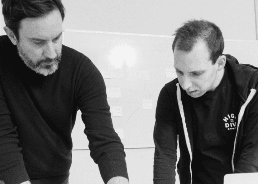 26lights marketing team mapping a strategy on a whiteboard