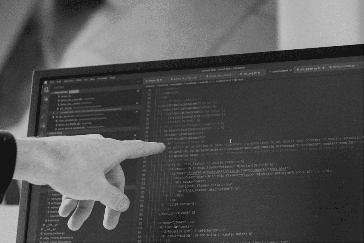 Close-up of a developer working in a code editor